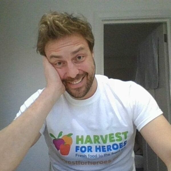 Oliver Bailey with a Harvest for Heroes t-shirt on