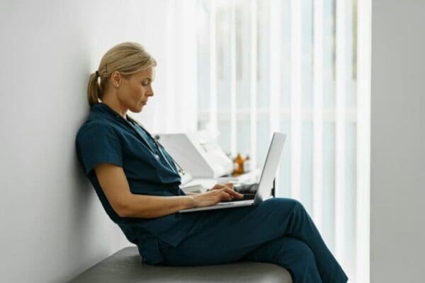 Female worker at home during an online meeting