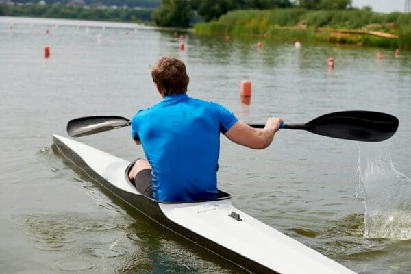 Rower floating in a canoe